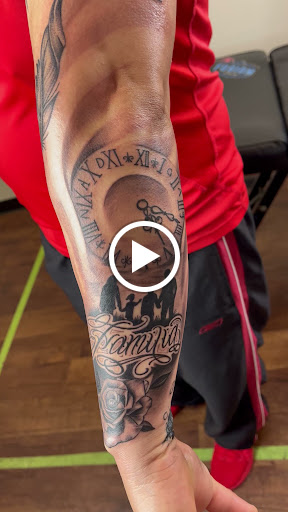 Explore black wolf tattoo ideas, creative tattoo ideas in Rogers, available at Ink Solutions Tattoo