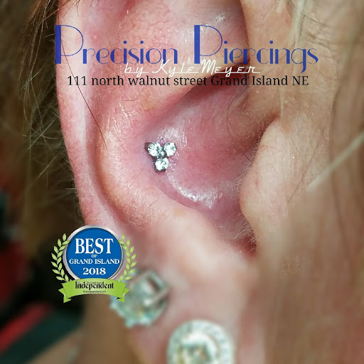Explore fishing lure tattoo ideas, creative tattoo ideas in Grand Island, available at Precision Piercings