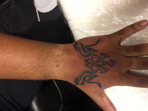 Explore submissive tattoo ideas, creative tattoo ideas in Bedford, available at Body Revolution Tattoos & Body Piercings