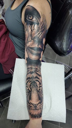 Explore get rich or die tryin tattoo ideas, creative tattoo ideas in Richmond, available at Captured Moment Tattoos