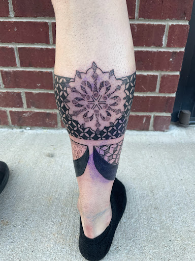 Explore hand name tattoo ideas, creative tattoo ideas in Mount Juliet, available at Division Street Tattoo Company