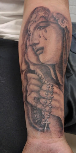 Explore back hand tattoo ideas, creative tattoo ideas in Mesa, available at Ranger Tattoo & Piercing