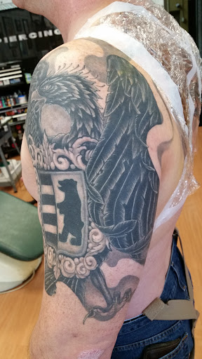 Find time tattoo ideas for your next unique tattoo in Puyallup at The Tattoo Shop