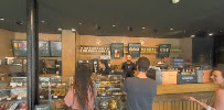 Atmosphère du Restaurant servant le petit-déjeuner Starbucks à Paris - n°10