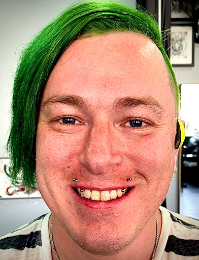 Explore reputation tattoo ideas, creative tattoo ideas in Orange, available at Symbiosis Body Piercing