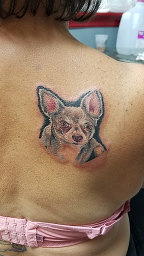 Explore electric guitar tattoo ideas, creative tattoo ideas in Myrtle Beach, available at Aces High Tattoo