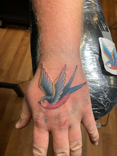 Explore heavy equipment tattoo ideas, creative tattoo ideas in Kirksville, available at Bedford Legacy Tattoo and Body Piercing