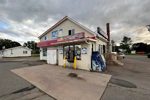 Mike's Drive Thru & Convenience And Tanning saloon image