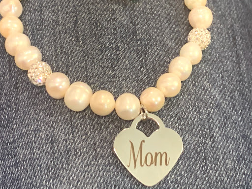 Find simple cross tattoo ideas for your next unique tattoo in Newton at Danas Fine Jewelry, Inc.