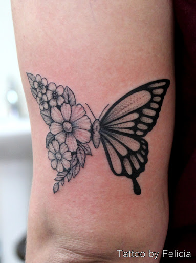 Explore women's arm tattoo ideas, creative tattoo ideas in Fort Myers, available at Tiger Lotus Tattoo and Piercing