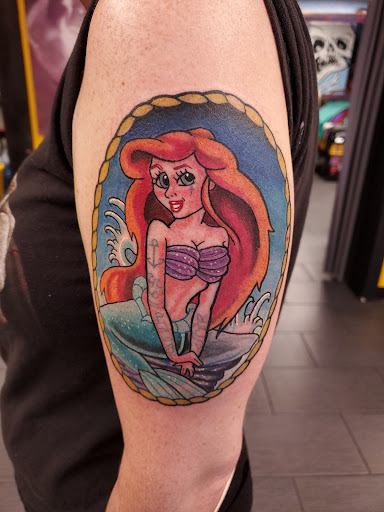 Explore bicep tattoo ideas for guys, creative tattoo ideas in Stafford Springs, available at Unwritten Tradition Tattoo Shop