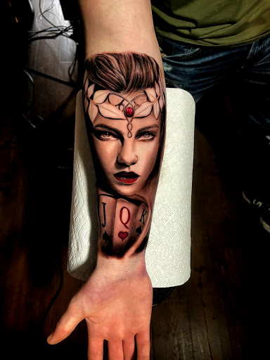 Explore blacksmith tattoo ideas, creative tattoo ideas in Johnson City, available at Gold Cross Tattoo Co.