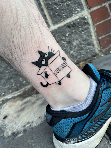 Explore cover up tattoo ideas on thigh, creative tattoo ideas in Jersey City, available at 7 Souls Tattoo & Body Piercing