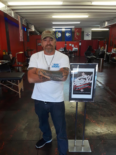 Explore thigh tattoo ideas male, creative tattoo ideas in Daytona Beach, available at Studio 21 Tattoo & Piercings Daytona Beach