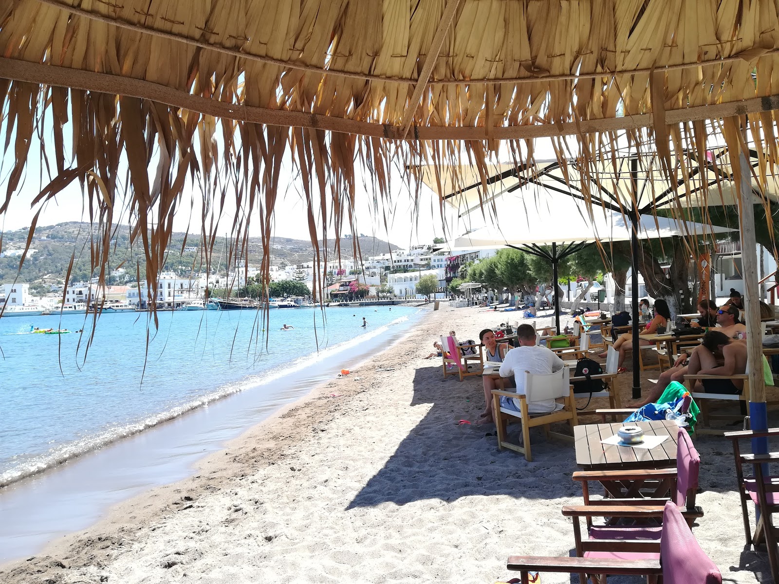 Foto de Skala Beach, Patmos con arena beige superficie