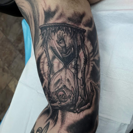 Explore arrow tattoo ideas for men, creative tattoo ideas in Billings, available at Sovereign Tattoo