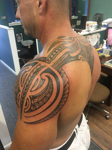 Explore female big tattoo ideas, creative tattoo ideas in Midvale, available at Aloha Tattoos - Award-Winning Utah Ink