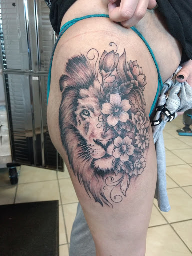 Explore lung cancer ribbon tattoo ideas, creative tattoo ideas in Milan, available at Apocalyptic Ink Studio