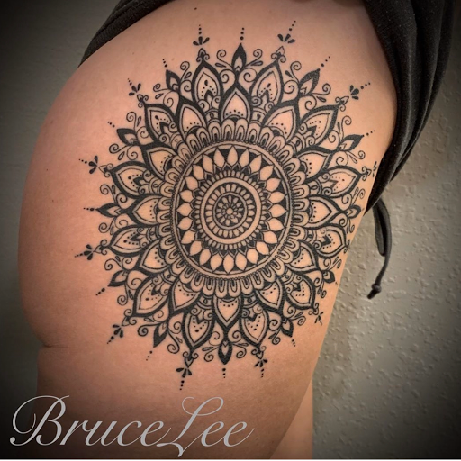 Explore owl tattoo ideas for females, creative tattoo ideas in Pigeon Forge, available at Black Orchid Tattoo Studio