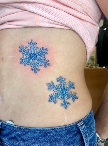 Explore bite me tattoo ideas, creative tattoo ideas in Goshen, available at Lady Luck Studio