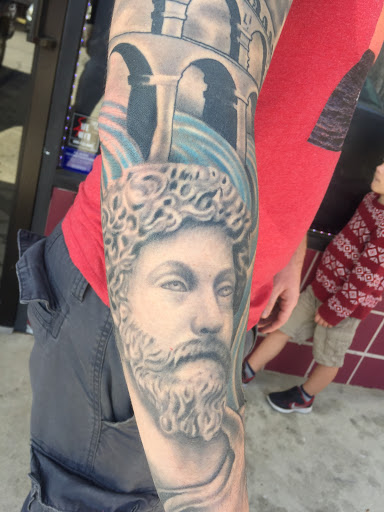 Explore cute ghost tattoo ideas, creative tattoo ideas in Jacksonville, available at Electric Legacy Tattoo