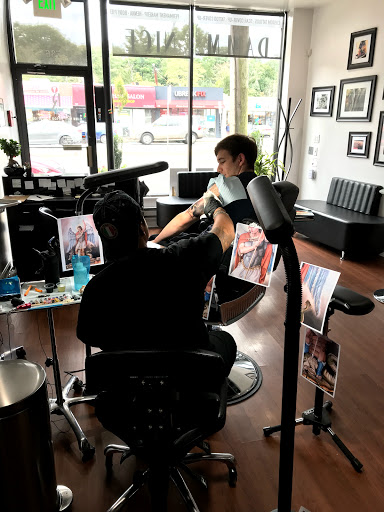 Explore witch hand tattoo ideas, creative tattoo ideas in Scarsdale, available at Damm Nice Tattoo & Body Art