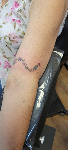 Explore halloween couple tattoo ideas, creative tattoo ideas in Farmington, available at Evolve