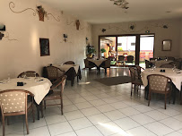 Atmosphère du Restaurant français Le Vieux Puits à Maraussan - n°1