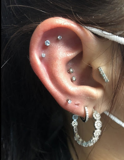 Explore finger tattoo ideas for women, creative tattoo ideas in Bay Shore, available at Piercings By Dean 95