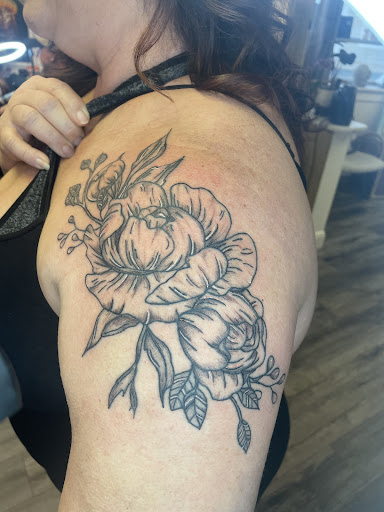 Explore cat and dog tattoo ideas, creative tattoo ideas in Trinity, available at Bella Donna Ink