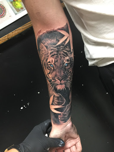 Explore plant tattoo ideas, creative tattoo ideas in Corona, available at Crop Circles Tattoo Studio