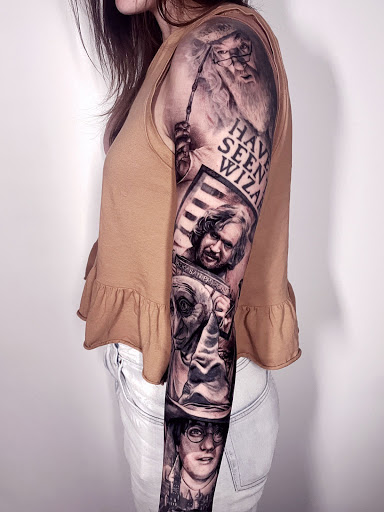 Explore tattoo ideas for your son, creative tattoo ideas in Kissimmee, available at Fallen Sparrow Tattoo Co