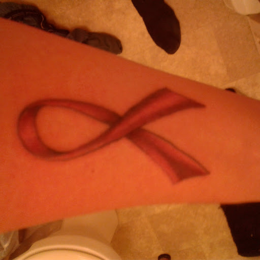 Tattoo Shop «Ink Shop», reviews and photos, 10979 Coursey Blvd, Baton Rouge, LA 70816, USA