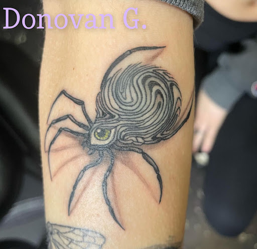 Explore dirt bike tattoo ideas, creative tattoo ideas in Bristol, available at Utopia Tattoo, Piercing and PMU