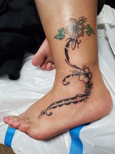 Explore son tattoo ideas for mother, creative tattoo ideas in Westland, available at Suicide Kings Tattoo