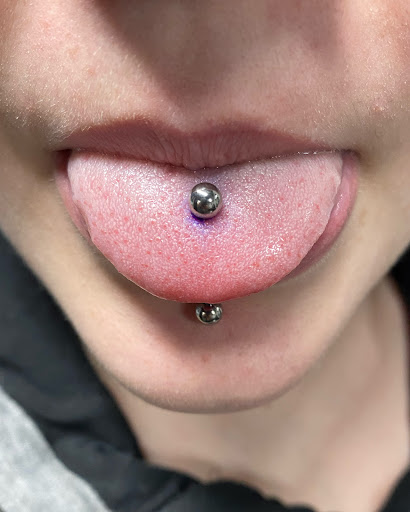 Explore cliff tattoo ideas, creative tattoo ideas in Oswego, available at Bodified