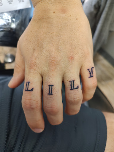 Explore minimal tattoo ideas for females, creative tattoo ideas in Davenport, available at Fine Ink Studios Tattoos