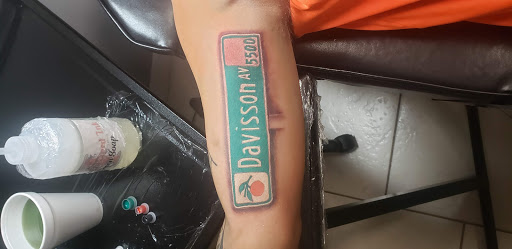 Explore hand wrist tattoo ideas, creative tattoo ideas in Ocoee, available at Slaughterized Ink Tattoo and Piercing Studio