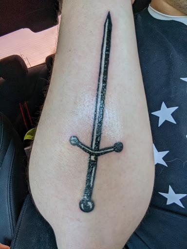 Explore son name tattoo ideas for dad, creative tattoo ideas in Odessa, available at Black Cat Tattoo Company