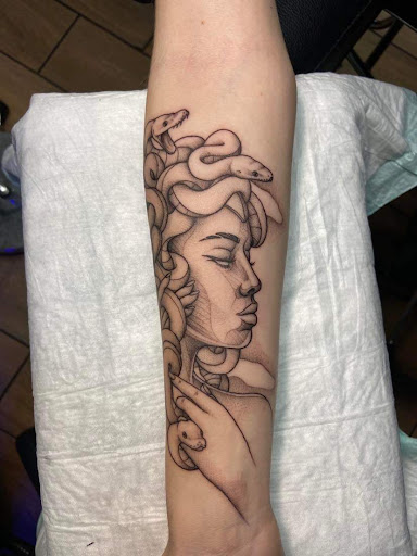 Explore winnie the pooh tattoo ideas, creative tattoo ideas in Fort Pierce, available at Goodfellas Tattoo & Body Piercing