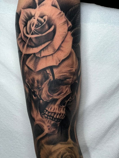 Explore tattoo ideas for men black, creative tattoo ideas in Lake Villa, available at Eternal Tiger Tattoo