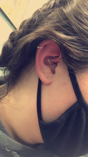 Explore curious george tattoo ideas, creative tattoo ideas in Powell, available at Elysium Body Enhancements