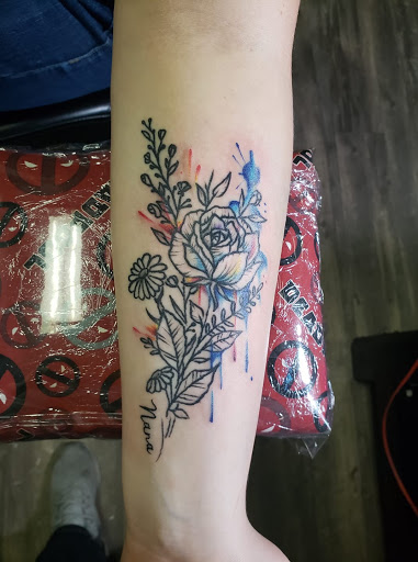 Explore male rib tattoo ideas, creative tattoo ideas in Athens, available at United Ink Tattoos and Body Piercings