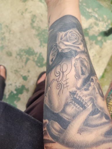 Explore scene tattoo ideas, creative tattoo ideas in Pendleton, available at Artistic Ink