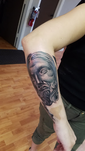 Explore calf tattoo ideas, creative tattoo ideas in Fort Lauderdale, available at Rock And Roll Tattoo, Piercing, Laser removal