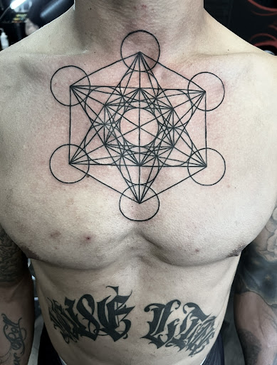 Explore rib tattoo ideas male, creative tattoo ideas in Silver City, available at Independent Ink Tattoo