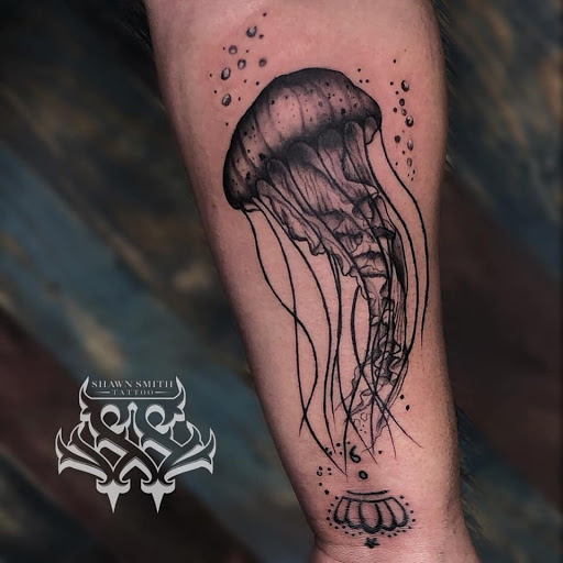 Explore haunted mansion tattoo ideas, creative tattoo ideas in Florissant, available at St. Louis Ink