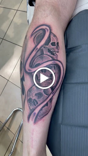 Explore tattoo ideas for the back of the neck, creative tattoo ideas in Augusta, available at Excalibur Art Collective