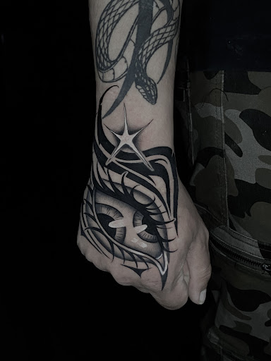 Explore name cover up tattoo ideas for men, creative tattoo ideas in Corona, available at Crop Circles Tattoo Studio