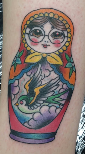 Explore lucky 13 tattoo ideas, creative tattoo ideas in Powell, available at Hummingbird Tattoo Studio